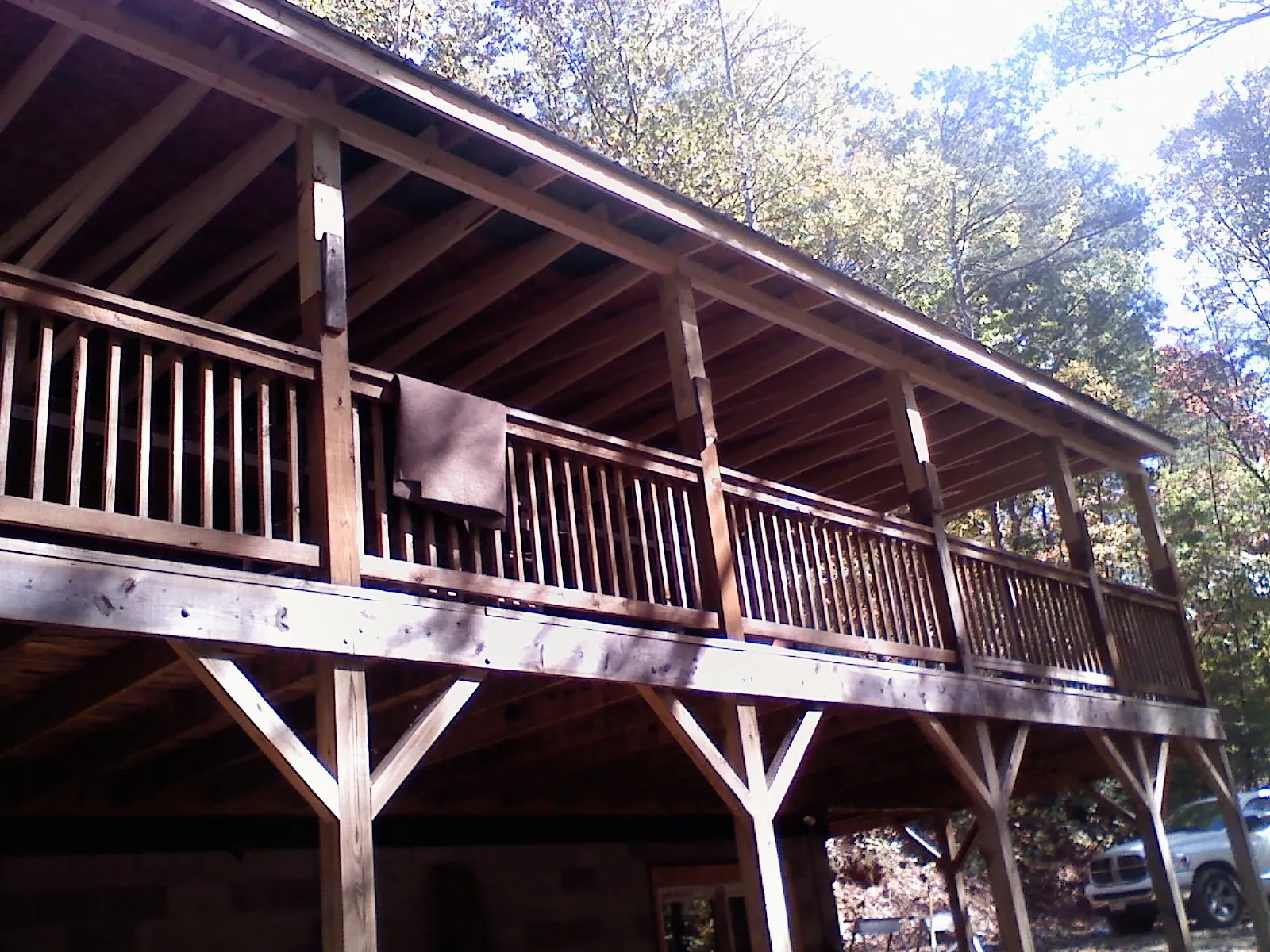 Timber framing under a new elevated porch and deck — Roof Leak Repair in West End by Roofing Brothers